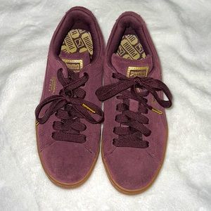Purple and gold suede pumas with Rubber bottom